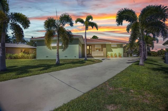 1315 Santiago Court PUNTA GORDA, FL House Active - Photo 1 of 38. Opens carousel modal