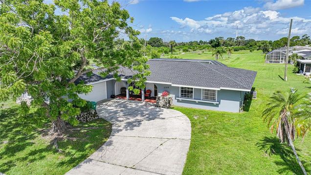 2305 Beacon Drive PORT CHARLOTTE, FL House Active - Photo 1 of 35. Opens carousel modal