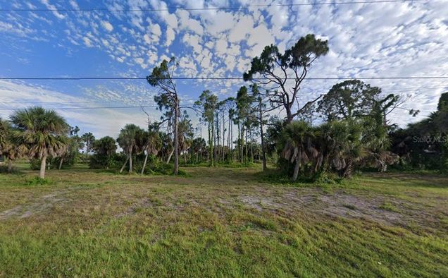 1185 Boundary Boulevard ROTONDA WEST, FL Plot of land Active - Photo 1 of 10. Opens carousel modal