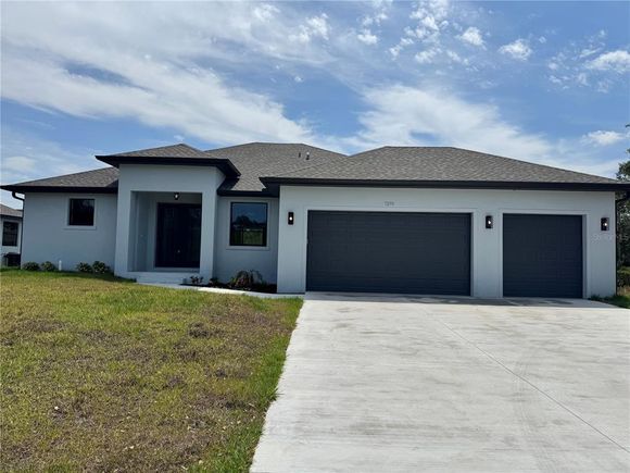 7290 Printer Street PORT CHARLOTTE, FL House Active - Photo 1 of 28. Opens carousel modal