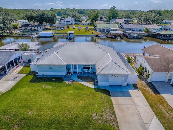 26608 E Cove Drive TAVARES, FL House Active - Photo 1 of 54. Opens carousel modal