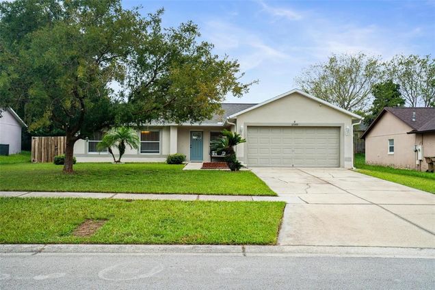 12300 Woodglen Circle CLERMONT, FL House Active - Photo 1 of 28. Opens carousel modal