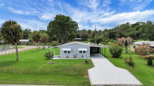 13230 SE 47th Court BELLEVIEW, FL House Active - Photo 1 of 34. Opens carousel modal