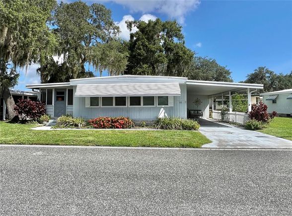 112 Audubon Drive LEESBURG, FL House Active - Photo 1 of 62. Opens carousel modal