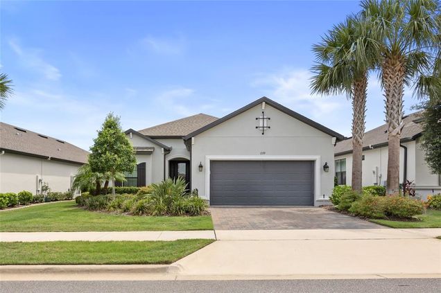 1339 Zeek Ridge Street CLERMONT, FL House Active - Photo 1 of 63. Opens carousel modal