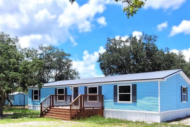3230 Tiger Creek Trail LAKE WALES, FL House Active - Photo 1 of 23. Opens carousel modal