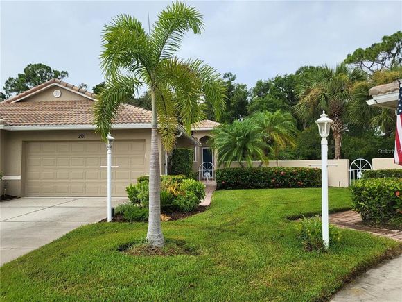 201 Auburn Woods Circle VENICE, FL House Active - Photo 1 of 50. Opens carousel modal