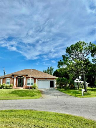 9269 Boca Grande Avenue ENGLEWOOD, FL House Active - Photo 1 of 19. Opens carousel modal