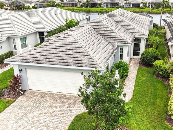 11161 Staveley Court VENICE, FL House Active - Photo 1 of 56. Opens carousel modal