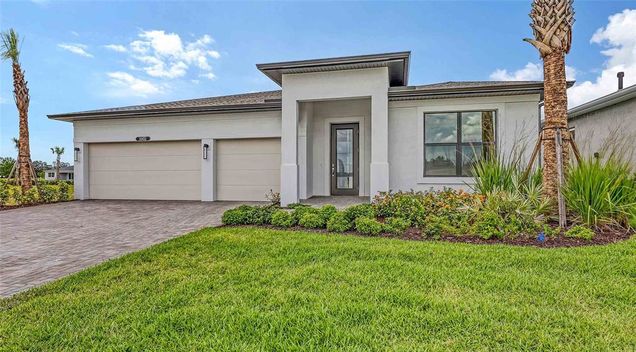 14451 Coastal Woodland Lane PARRISH, FL House Active - Photo 1 of 44. Opens carousel modal