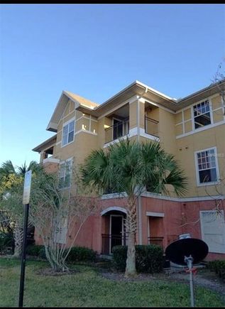 3700 Castle Pines Lane Unit 4032 ORLANDO, FL Condo Active - Photo 1 of 13. Opens carousel modal