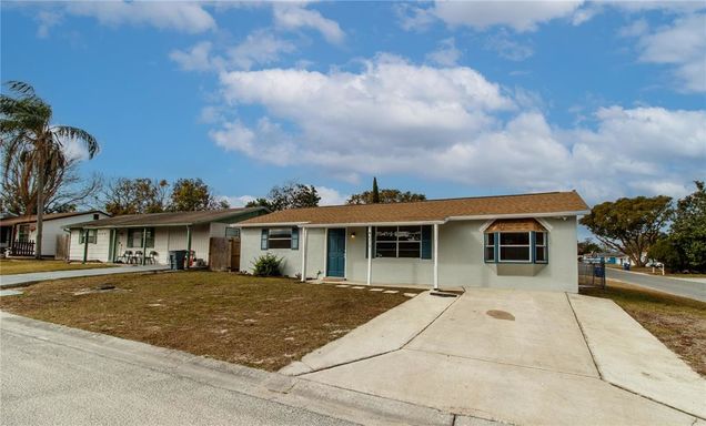 4215 Pecos Drive NEW PORT RICHEY, FL House Active - Photo 1 of 27. Opens carousel modal