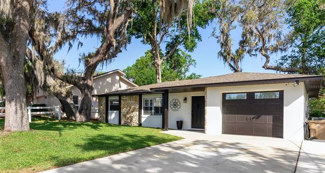 11801 Lake Susan Court CLERMONT, FL House Active - Photo 1 of 26. Opens carousel modal