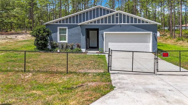 13297 SW 69th Place OCALA, FL House Active - Photo 1 of 53. Opens carousel modal