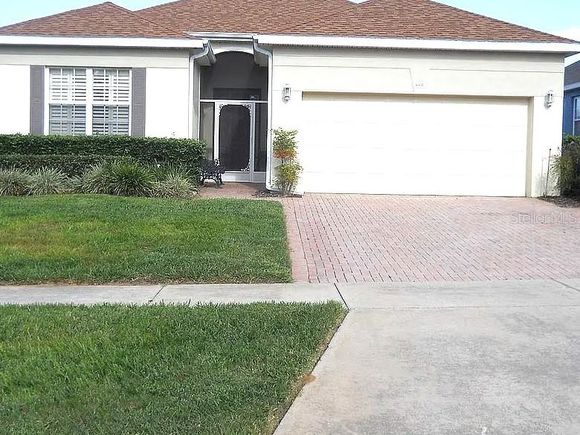 #O6309077 CLERMONT, FL House Active - Photo 1 of 30. Opens carousel modal