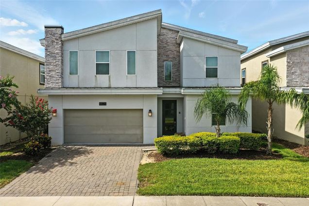 8828 Cruden Bay Court DAVENPORT, FL House Active - Photo 1 of 65. Opens carousel modal