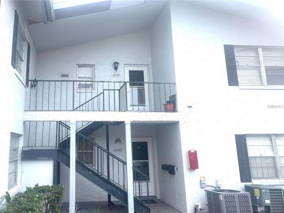 6042 Amberly Avenue Unit F55 ORLANDO, FL Condo Active - Photo 1 of 12. Opens carousel modal