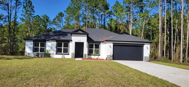 2147 Avocado Boulevard BUNNELL, FL House Active - Photo 1 of 32. Opens carousel modal