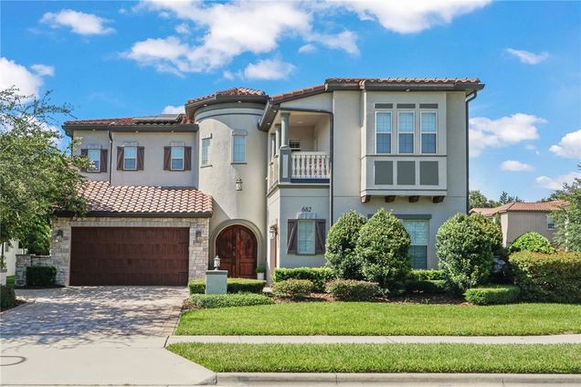 682 Canopy Estates Drive WINTER GARDEN, FL House Active - Photo 1 of 52. Opens carousel modal