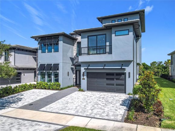 984 Jack Nicklaus Court KISSIMMEE, FL House Active - Photo 1 of 94. Opens carousel modal