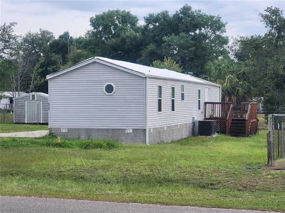 6750 NE 1st Place OCALA, FL House Active - Photo 1 of 14. Opens carousel modal