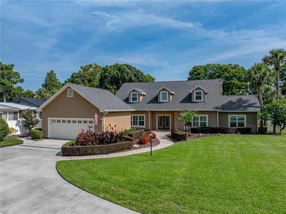 1123 Cypress Point W WINTER HAVEN, FL House Active - Photo 1 of 97. Opens carousel modal