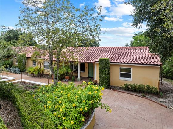1121 Sunset Drive LAKE WALES, FL House Active - Photo 1 of 73. Opens carousel modal