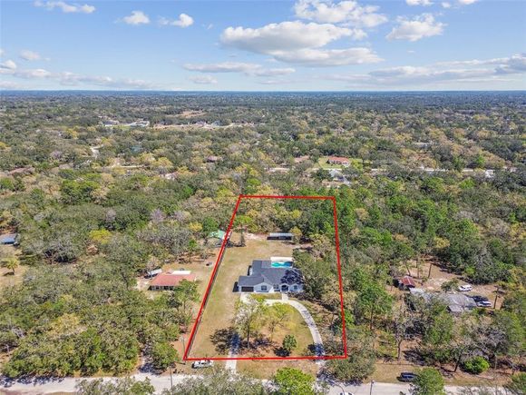 18214 Ozark Drive HUDSON, FL House Active - Photo 1 of 63. Opens carousel modal