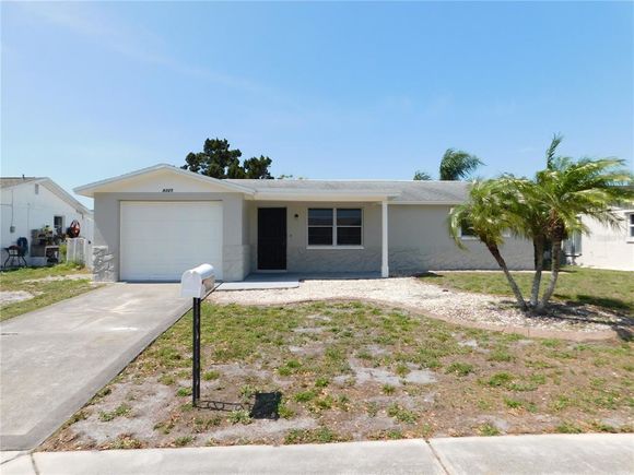 9325 Saint Regis Lane PORT RICHEY, FL House Active - Photo 1 of 35. Opens carousel modal