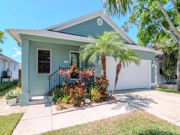 7311 S Kissimmee Street TAMPA, FL House Active - Photo 1 of 46. Opens carousel modal