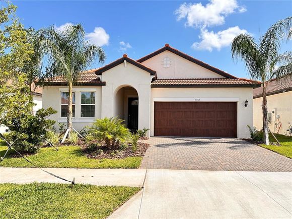 17132 Holly Well Avenue WIMAUMA, FL House Active - Photo 1 of 20. Opens carousel modal