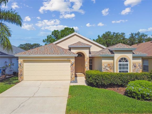 2609 Rosehaven Drive WESLEY CHAPEL, FL House Active - Photo 1 of 73. Opens carousel modal