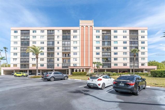 19029 Us Highway 19 N Unit 9-404 CLEARWATER, FL Condo Active - Photo 1 of 45. Opens carousel modal