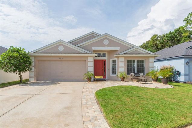 25236 Flying Ebony Lane WESLEY CHAPEL, FL House Active - Photo 1 of 37. Opens carousel modal