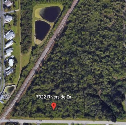 7022 Riverside Drive PUNTA GORDA, FL Plot of land Active - Photo 1 of 7. Opens carousel modal