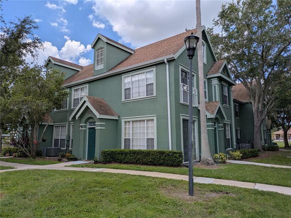 9548 Lake Chase Island Way TAMPA, FL Townhouse Active - Photo 1 of 15. Opens carousel modal