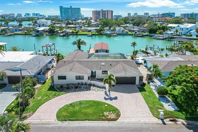 74 Windward Island CLEARWATER BEACH, FL House Active - Photo 1 of 72. Opens carousel modal