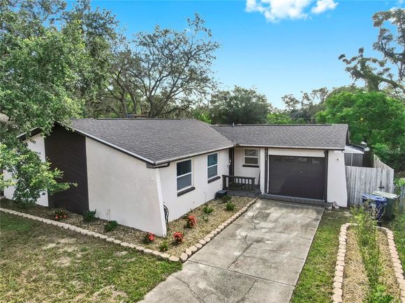 10713 N Ojus Drive TAMPA, FL House Active - Photo 1 of 31. Opens carousel modal