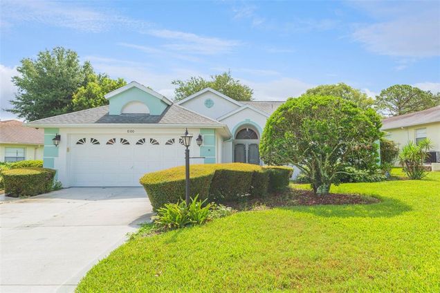 8100 Hidden Hills Drive SPRING HILL, FL House Active - Photo 1 of 43. Opens carousel modal