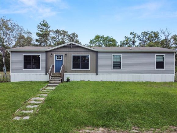 9146 Orchard Way SPRING HILL, FL House Active - Photo 1 of 28. Opens carousel modal