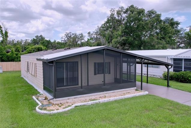 35924 Bueno Dr ZEPHYRHILLS, FL House Active - Photo 1 of 70. Opens carousel modal