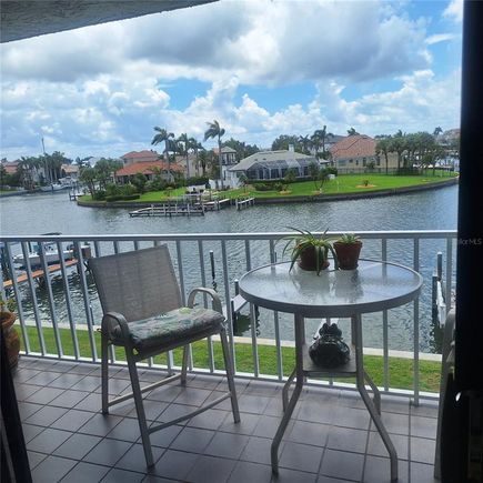 719 Pinellas Bayway S Unit 203 ST PETERSBURG, FL Condo Active - Photo 1 of 56. Opens carousel modal