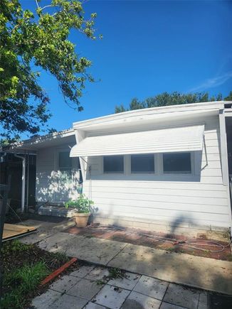 5320 W Pine Street N ST PETERSBURG, FL House Active - Photo 1 of 15. Opens carousel modal