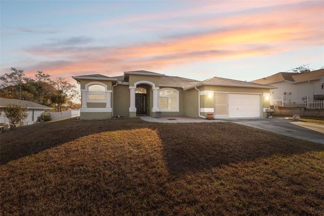3110 Lema Drive SPRING HILL, FL House Active - Photo 1 of 45. Opens carousel modal
