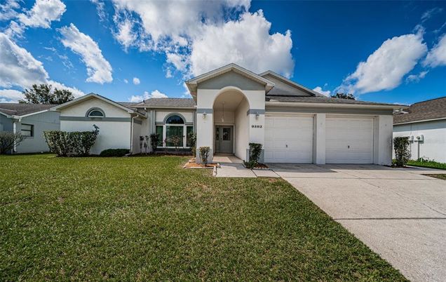 9402 Tournament Drive HUDSON, FL House Active - Photo 1 of 41. Opens carousel modal