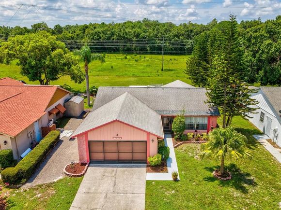 7820 Jenner Avenue NEW PORT RICHEY, FL House Active - Photo 1 of 50. Opens carousel modal