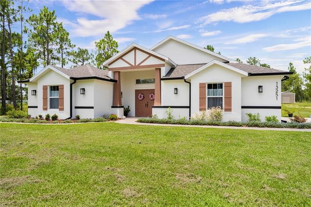 13251 Downy Woodpecker Road WEEKI WACHEE, FL House Active - Photo 1 of 80. Opens carousel modal
