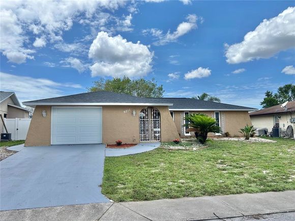 9211 Haverford Lane PORT RICHEY, FL House Active - Photo 1 of 38. Opens carousel modal