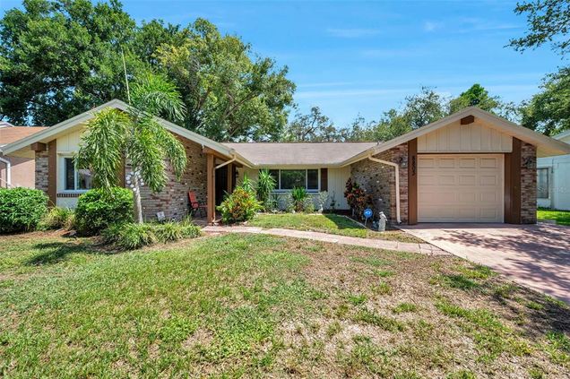 8803 Mill Creek Lane HUDSON, FL House Active - Photo 1 of 65. Opens carousel modal