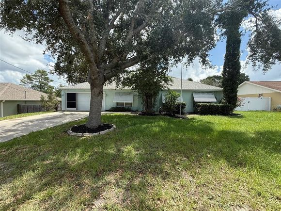 5484 Moongate Road SPRING HILL, FL House Active - Photo 1 of 20. Opens carousel modal